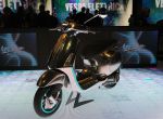 MILAN, ITALY - NOVEMBER 09: New model of Piaggio Vespa electric is displayed at EICMA 2016 - 74th International Motorcycle Exhibition on November 9, 2016 in Milan, Italy. EICMA 2016 opens to the public November 10. (Photo by Pier Marco Tacca/Getty Images)