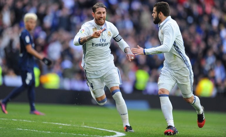 El central celebra con Nacho su primer gol al Málaga. El central celebra con Nacho su primer gol al Málaga.