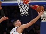 Feb 12, 2017; New York, NY, USA; New York Knicks center Willy Hernangomez (14) drives to the basket past San Antonio Spurs guard Danny Green (14) during the second half at Madison Square Garden. Mandatory Credit: Adam Hunger-USA TODAY Sports