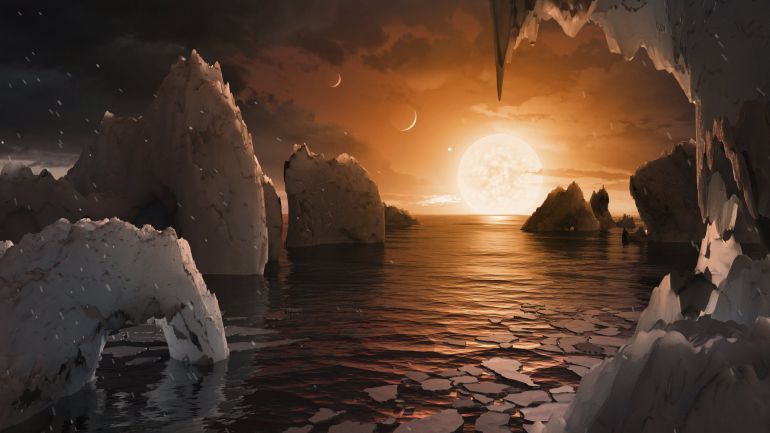 Recreación artística de cómo podría ser la superficie del exoplaneta TRAPPIST-1f, localizado en el sistema TRAPPIST-1, en la constelación Acuario. A tan solo 40 años luz de la Tierra hay un sistema estelar con siete planetas de masa similar al nuestro, tres de los cuales se encuentran en la zona habitable. Recreación artística de cómo podría ser la superficie del exoplaneta TRAPPIST-1f, localizado en el sistema TRAPPIST-1, en la constelación Acuario. A tan solo 40 años luz de la Tierra hay un sistema estelar con siete planetas de masa similar al nuestro, tres de los cuales se encuentran en la zona habitable.