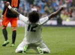 GRA380. MADRID, 06/06/2016.- El defensa brasileño del Real Madrid Marcelo Vieira celebra su gol, segundo del equipo frente al Valencia CF, durante el partido correspondiente a la trigésima quinta jornada de LaLiga Santander disputado hoy en el estadio Santiago Bernabéu. EFE/Javier Lizón