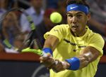 Aug 10, 2017; Montreal, Quebec, Canada; Rafael Nadal of Spain hits a backhand against Denis Shapovalov of Canada (not pictured) during the Rogers Cup tennis tournament at Uniprix Stadium. Mandatory Credit: Eric Bolte-USA TODAY Sports