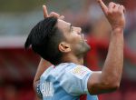 Soccer Football - Ligue 1 - Dijon vs Monaco - Dijon, France - August 13, 2017 Monaco’s Radamel Falcao celebrates scoring their third goal REUTERS/Robert Pratta
