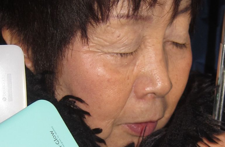 La 'viuda negra de Tokio', Chisako Kakehi, tras ser arrestada La 'viuda negra de Tokio', Chisako Kakehi, tras ser arrestada