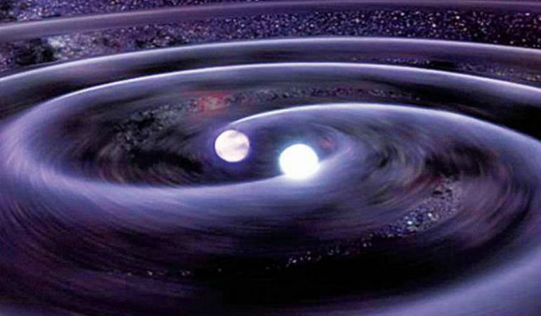Ilustración de un sistema binario de estrellas de neutrones en proceso de fusión, con emisión de ondas gravitatorias.
Ilustración de un sistema binario de estrellas de neutrones en proceso de fusión, con emisión de ondas gravitatorias.