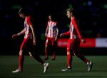 Soccer Football - La Liga Santander - Malaga CF vs Atletico Madrid - La Rosaleda, Malaga, Spain - February 10, 2018 Atletico Madrid's Filipe Luis and Antoine Griezmann REUTERS/Jon Nazca