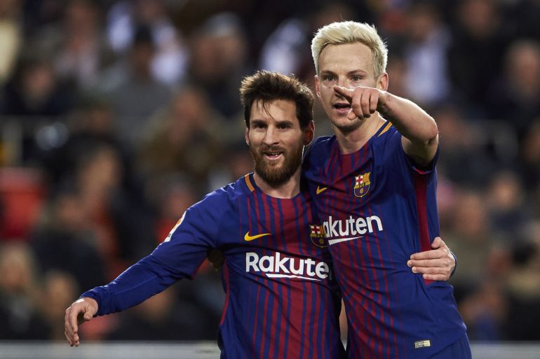 Messi y Rakitic celebran un gol. Messi y Rakitic celebran un gol.