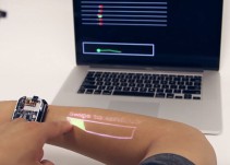 Crean un reloj inteligente que convierte tu brazo en una pantalla táctil