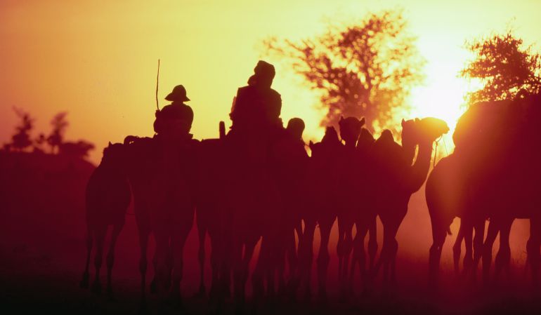 Tuaregs en sus camellos Tuaregs en sus camellos