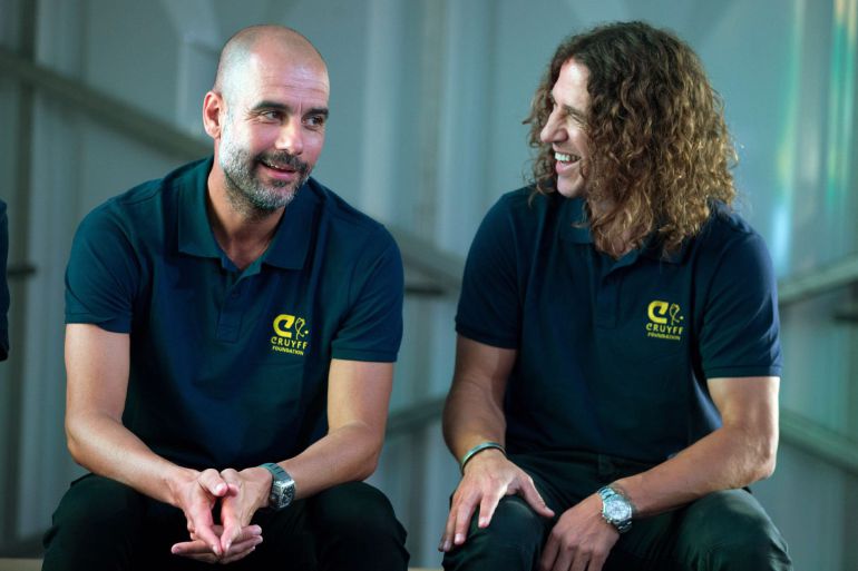 Guardiola, junto a Puyol en el acto de la Fundación Cruyff Guardiola, junto a Puyol en el acto de la Fundación Cruyff