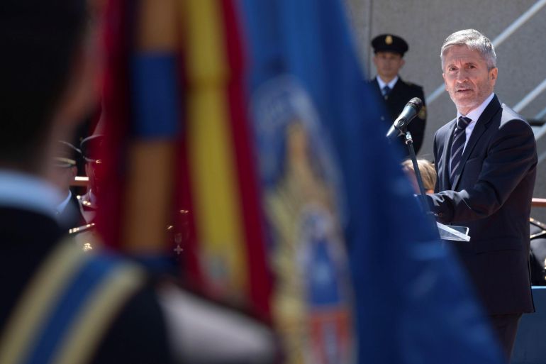 El ministro del Interior, Fernando Grande-Marlaska, durante el acto de jura del cargo y entrega de títulos de la XXXII Promoción de la Escala Básica de la Policía Nacional El ministro del Interior, Fernando Grande-Marlaska, durante el acto de jura del cargo y entrega de títulos de la XXXII Promoción de la Escala Básica de la Policía Nacional