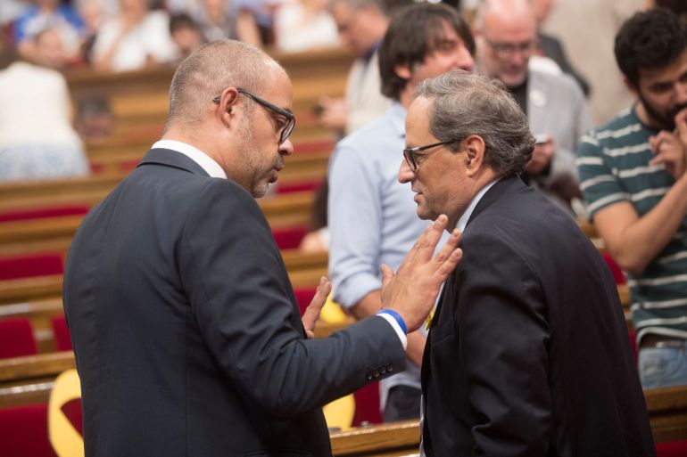 El presidente de la Generalitat, Quim Torra y el conseller de Interior Miquel Buch (i), tras la suspensión este mediodía del pleno a celebrar, en donde se esperaba resolver la situación de los diputados suspendidos por el Tribunal Supremo El presidente de la Generalitat, Quim Torra y el conseller de Interior Miquel Buch (i), tras la suspensión este mediodía del pleno a celebrar, en donde se esperaba resolver la situación de los diputados suspendidos por el Tribunal Supremo