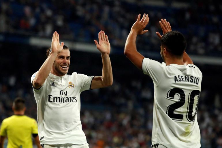 Bale celebra su gol con Asensio Bale celebra su gol con Asensio