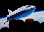 SpaceX CEO Elon Musk shows how the new BFR works during a press conference announcing the world’s first private passenger scheduled to fly around the Moon aboard SpaceX’s BFR launch vehicle, at the company's headquarters in Hawthorne, California, U.S. September 17, 2018. REUTERS/Gene Blevins