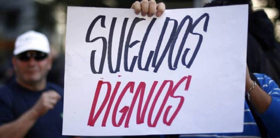 Cartel de una manifestación en demanda de salarios dignos Cartel de una manifestación en demanda de salarios dignos