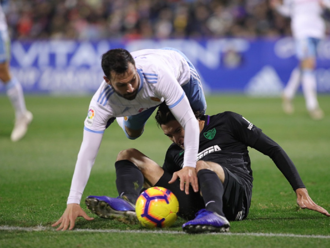 Guitián, en una acción del partido de la primera vuelta ante el Málaga Guitián, en una acción del partido de la primera vuelta ante el Málaga
