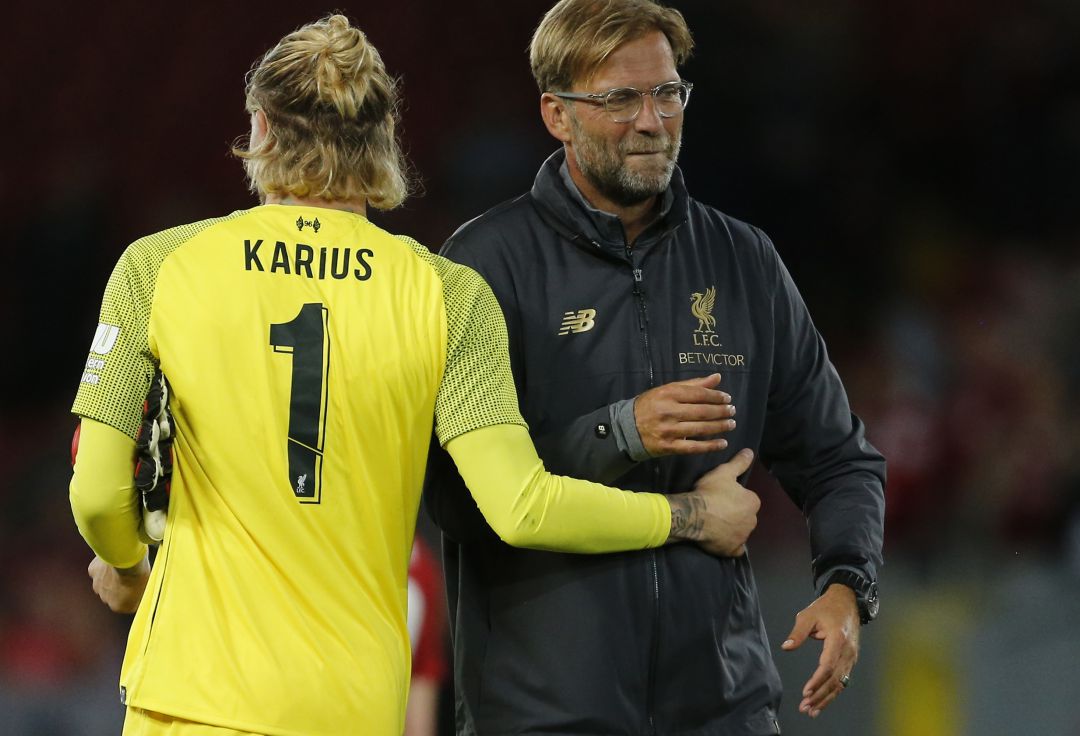 Karius, el portero que protagonizó por sus errores la final de Kiev, junto a Klopp. Karius, el portero que protagonizó por sus errores la final de Kiev, junto a Klopp.