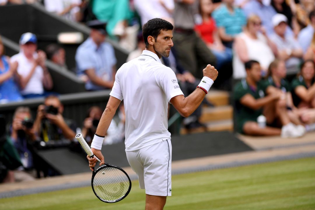 Djokovic celebra un punto en la final ante Federer. Djokovic celebra un punto en la final ante Federer.