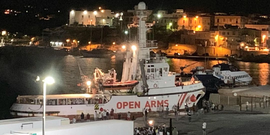 The Spanish humanitarian ship 'Open Arms', with migrants on board, arrives in Lampedusa island, southern Italy, 20 August 2019. An Italian public prosecutor has ordered the confiscation of the migrant ship Open Arms, carrying some 140 migrants, and the evacuation of migrants on board to the island of Lampedusa on 20 August 2019 after inspecting the boat, according media reports The Spanish humanitarian ship 'Open Arms', with migrants on board, arrives in Lampedusa island, southern Italy, 20 August 2019. An Italian public prosecutor has ordered the confiscation of the migrant ship Open Arms, carrying some 140 migrants, and the evacuation of migrants on board to the island of Lampedusa on 20 August 2019 after inspecting the boat, according media reports
