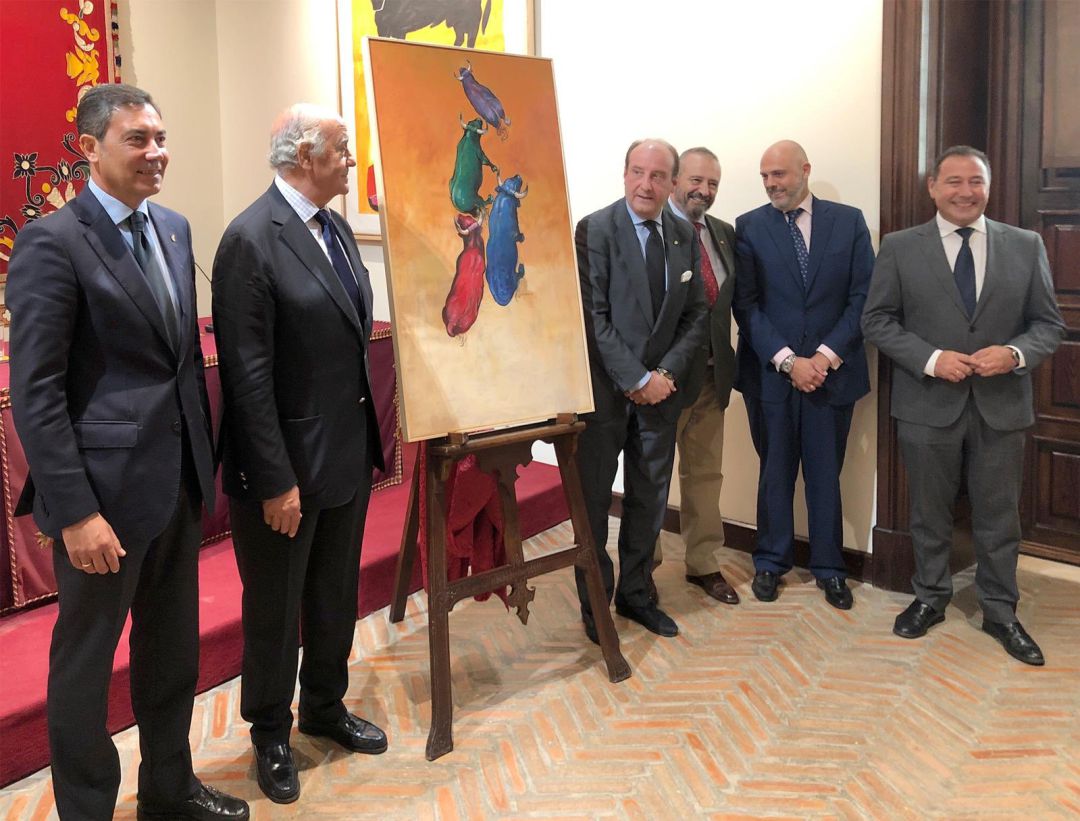 De izquierda a derecha, junto al cartel pictórico del festival del 12 de octubre, Marcelino Serrano, hermano mayor del Baratillo; Ramón Valencia, gerente de la Empresa Pagés; Joaquín Moeckel, el pintor Luis Rizo; Sergio Sopeña, hermano mayor de la Esperanza de Triana; y Ricardo Sánchez, delegado del Gobierno de la Junta en Sevilla De izquierda a derecha, junto al cartel pictórico del festival del 12 de octubre, Marcelino Serrano, hermano mayor del Baratillo; Ramón Valencia, gerente de la Empresa Pagés; Joaquín Moeckel, el pintor Luis Rizo; Sergio Sopeña, hermano mayor de la Esperanza de Triana; y Ricardo Sánchez, delegado del Gobierno de la Junta en Sevilla