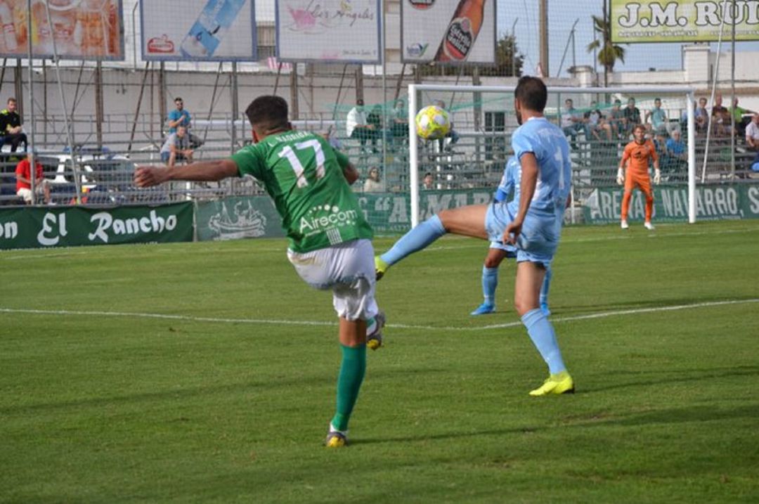 Un momento del partido. Un momento del partido.