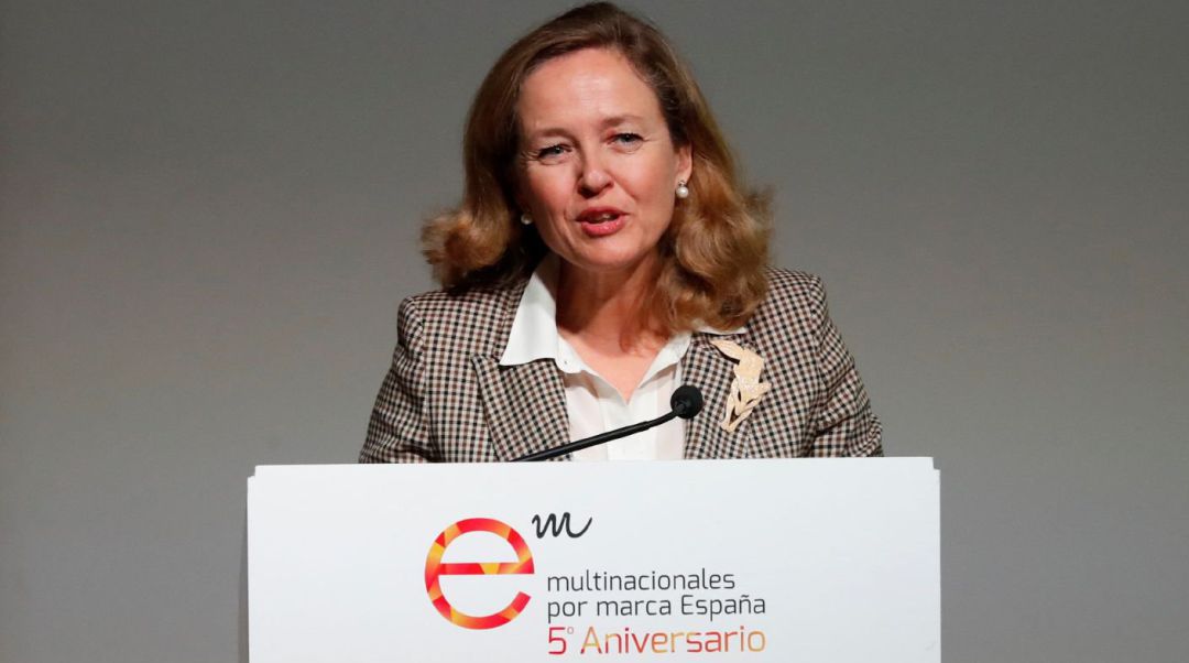 La ministra de Economía y Empresa en funciones, Nadia Calviño,durante su intervención en la inauguración de la jornada 'España ante los desafíos del siglo XXI. Multinacionales por marca España, cinco años trabajando por el desarrollo económico y social del país'. La ministra de Economía y Empresa en funciones, Nadia Calviño,durante su intervención en la inauguración de la jornada 'España ante los desafíos del siglo XXI. Multinacionales por marca España, cinco años trabajando por el desarrollo económico y social del país'.