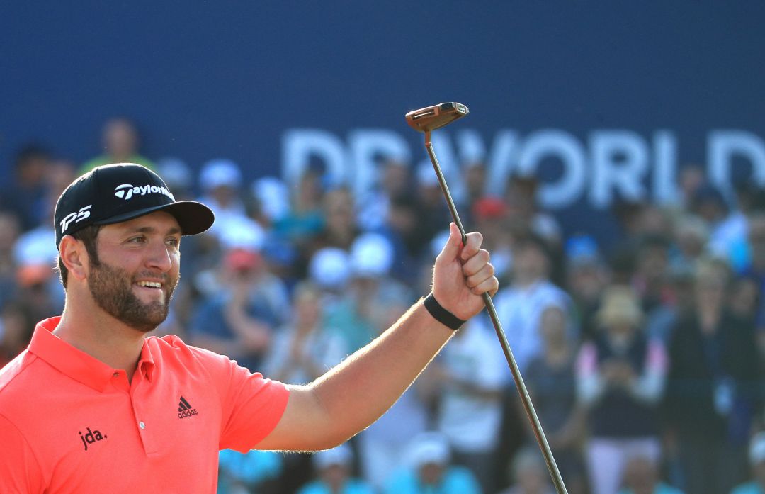 DUBAI, UNITED ARAB EMIRATES - NOVEMBER 24: Jon Rahm of Spain celebrates on the eighteenth green after winning the DP World Tour Championship and Race to Dubai during Day Four of the DP World Tour Championship Dubai at Jumerirah Golf Estates on November 24, 2019 in Dubai, United Arab Emirates. DUBAI, UNITED ARAB EMIRATES - NOVEMBER 24: Jon Rahm of Spain celebrates on the eighteenth green after winning the DP World Tour Championship and Race to Dubai during Day Four of the DP World Tour Championship Dubai at Jumerirah Golf Estates on November 24, 2019 in Dubai, United Arab Emirates.