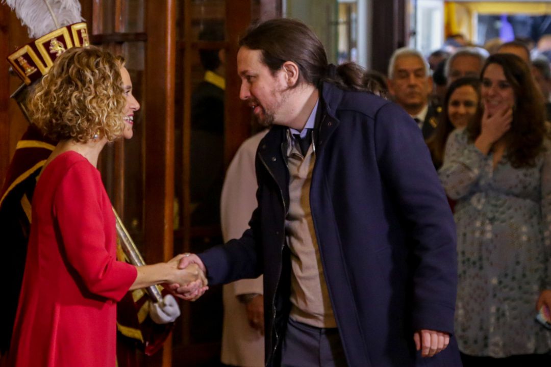 Meritxell Batet y Pablo Iglesias se saludan en el acto de Conmemoración del Día de la Constitución en el Congreso de los Diputados, en Madrid. Meritxell Batet y Pablo Iglesias se saludan en el acto de Conmemoración del Día de la Constitución en el Congreso de los Diputados, en Madrid.