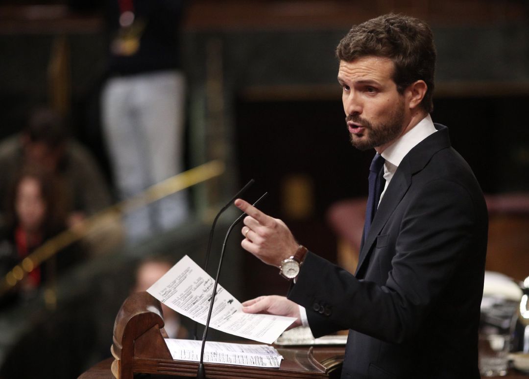 El presidente del PP, Pablo Casado, interviene desde la tribuna del Congreso de los Diputados en la primera sesión del debate de investidura del candidato socialista a la Presidencia de Gobierno en la XIV Legislatura en Madrid (España), a 4 de enero de 20 El presidente del PP, Pablo Casado, interviene desde la tribuna del Congreso de los Diputados en la primera sesión del debate de investidura del candidato socialista a la Presidencia de Gobierno en la XIV Legislatura en Madrid (España), a 4 de enero de 20