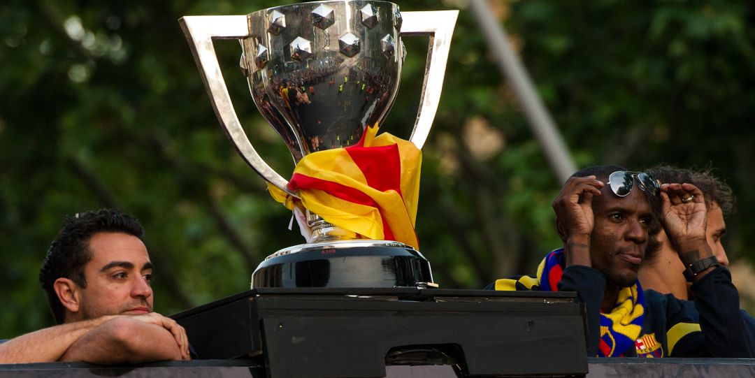 Abidal y Xavi Hernández, durante la celebración de un título de Liga del Barcelona Abidal y Xavi Hernández, durante la celebración de un título de Liga del Barcelona