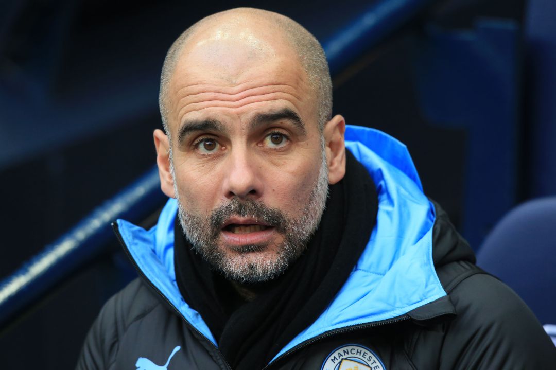 Guardiola en el banquillo del Manchester City Guardiola en el banquillo del Manchester City