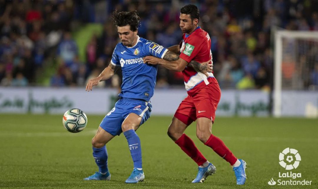 Jason Remeseiro con el Getafe ante el Granada Jason Remeseiro con el Getafe ante el Granada