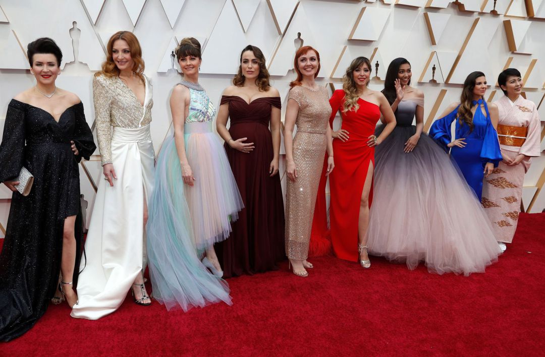 Cantantes de diferentes nacionalidades que interpretaron una canción de Frozen 2 en la última gala de los Oscars. De rojo, Gisela Cantantes de diferentes nacionalidades que interpretaron una canción de Frozen 2 en la última gala de los Oscars. De rojo, Gisela
