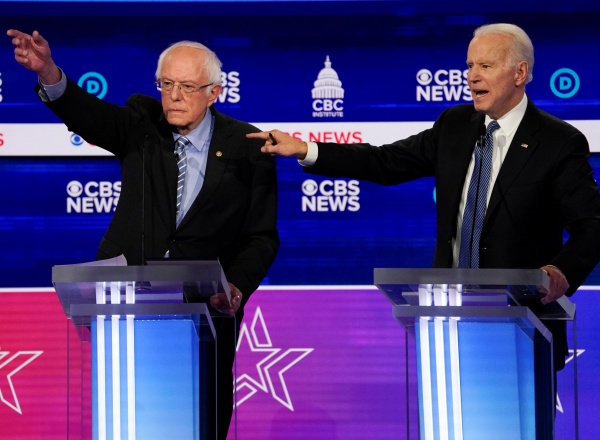 Democratic 2020 U.S. presidential candidates Senator Bernie Sanders and former Vice President Joe Biden have an exchange in the tenth Democratic 2020 presidential debate at the Gaillard Center in Charleston, South Carolina, U.S. February 25, 2020. REUTERS/Jonathan Ernst
