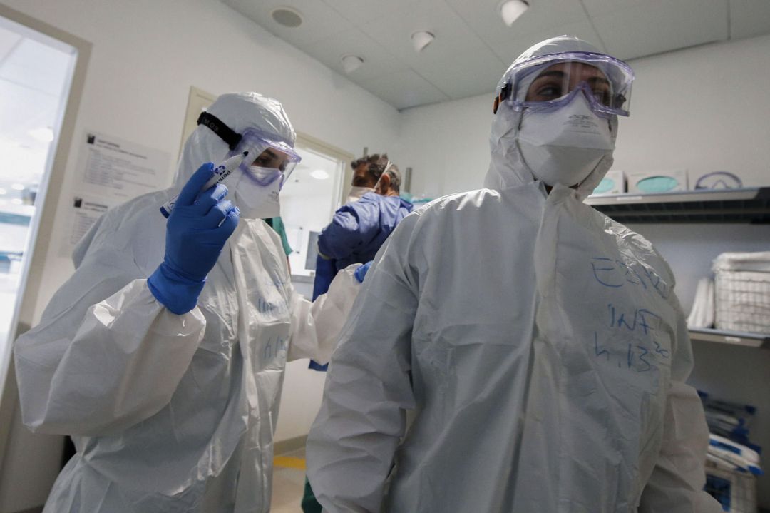 A nurse at the new Covid Campus Center, a facility of the hospital complex of the Universus Campus Bio-Medical Polyclinic in Rome, Italy, has her name written on her protective suit to be recognizable before entering the wards where patients infected with the novel SARS-CoV-2 coronavirus that causes the COVID-19 disease are treated, 02 April 2020. The area that houses the Covid Center Campus is a structure separate from the rest of the Campus Bio-Medico University Hospital which continues to function safely. A nurse at the new Covid Campus Center, a facility of the hospital complex of the Universus Campus Bio-Medical Polyclinic in Rome, Italy, has her name written on her protective suit to be recognizable before entering the wards where patients infected with the novel SARS-CoV-2 coronavirus that causes the COVID-19 disease are treated, 02 April 2020. The area that houses the Covid Center Campus is a structure separate from the rest of the Campus Bio-Medico University Hospital which continues to function safely.