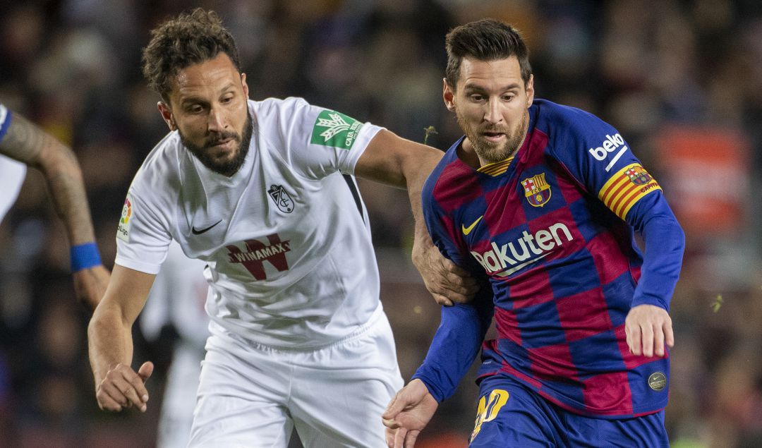 Germán, en una acción con Leo Messi. Germán, en una acción con Leo Messi.