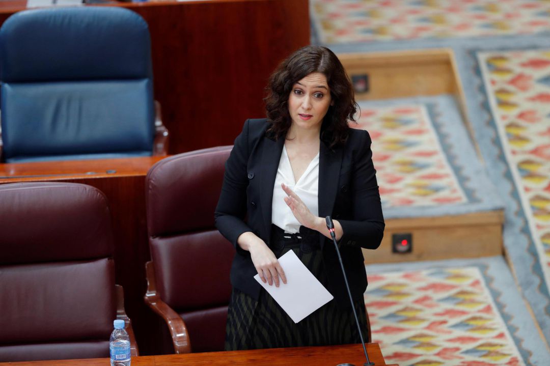 La presidenta de la Comunidad de Madrid, Isabel Díaz Ayuso, durante su intervención en el pleno celebrado este jueves en la Asamblea de Madrid. La presidenta de la Comunidad de Madrid, Isabel Díaz Ayuso, durante su intervención en el pleno celebrado este jueves en la Asamblea de Madrid.