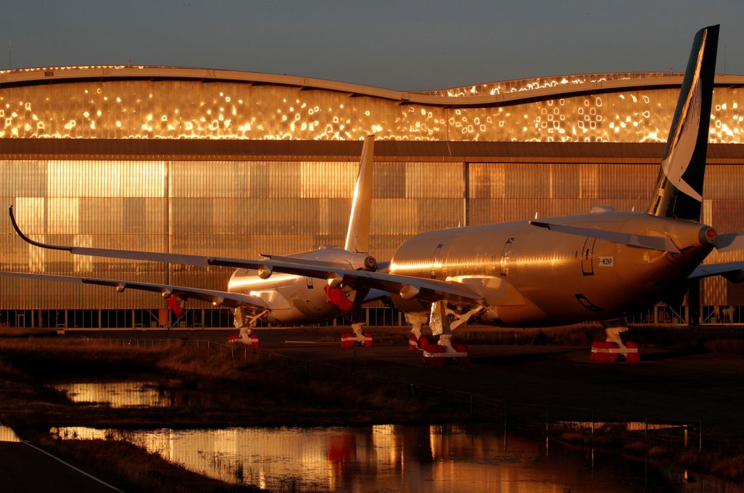 A350 passenger aircraft are seen parked at the Airbus factory in Blagnac near Toulouse A350 passenger aircraft are seen parked at the Airbus factory in Blagnac near Toulouse