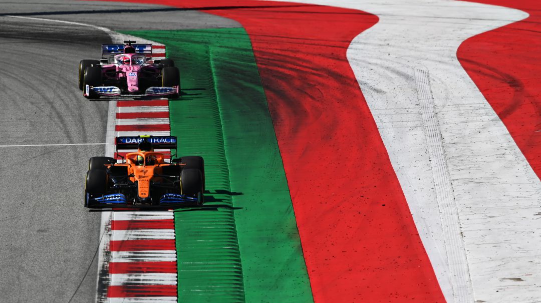 Lando Norris es seguido por Sergio Pérez durante el GP de Estiria. Lando Norris es seguido por Sergio Pérez durante el GP de Estiria.