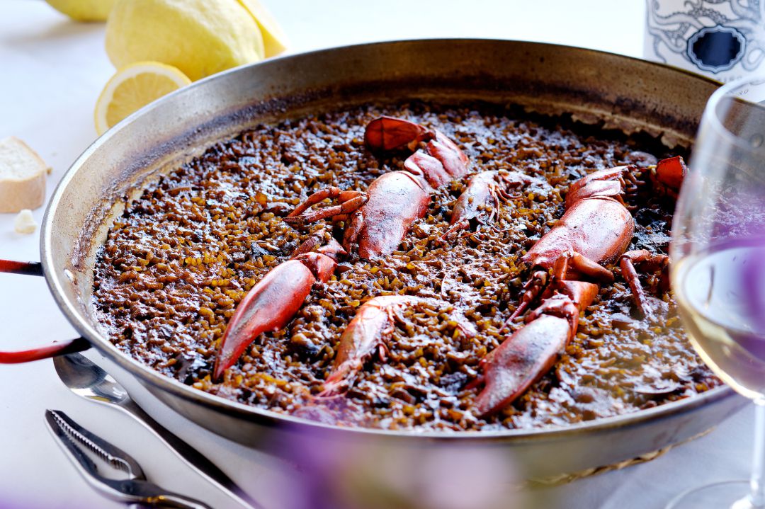 Fotografía de un arroz seco con bogavante Fotografía de un arroz seco con bogavante
