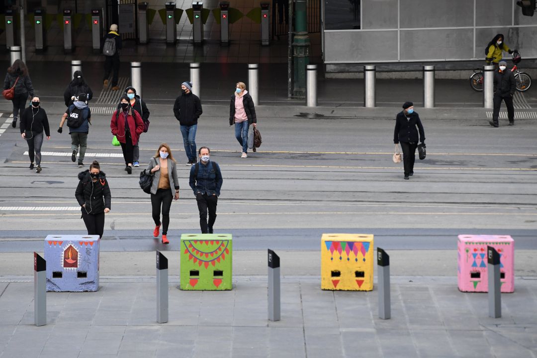Ciudadanos con mascarilla en Melbourne (Australia) Ciudadanos con mascarilla en Melbourne (Australia)