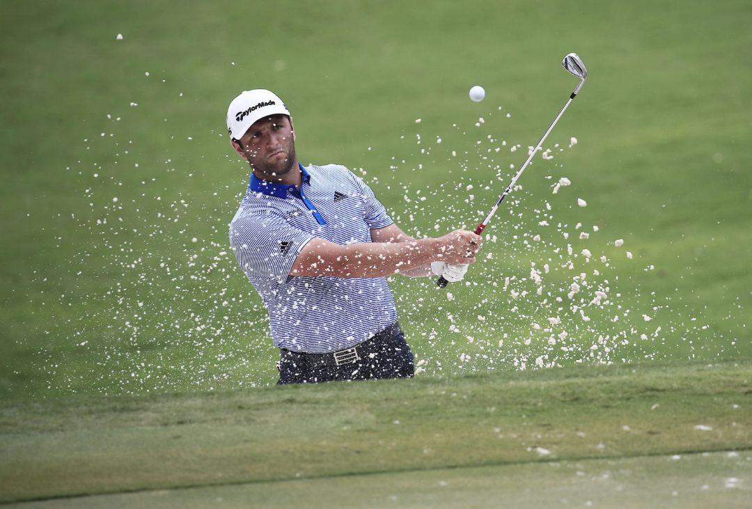 Jon Rahm of Spain hits out of a bunker for the second time on the second hole during the third round of the World Golf Championships-FedEx St. Jude Invitational golf tournament at TPC Southwind in Memphis, Tennessee, USA, 01 August 2020. Competition runs from 30 July through 02 August without fans in attendance. EFE EPA TANNEN MAURY Jon Rahm of Spain hits out of a bunker for the second time on the second hole during the third round of the World Golf Championships-FedEx St. Jude Invitational golf tournament at TPC Southwind in Memphis, Tennessee, USA, 01 August 2020. Competition runs from 30 July through 02 August without fans in attendance. EFE EPA TANNEN MAURY