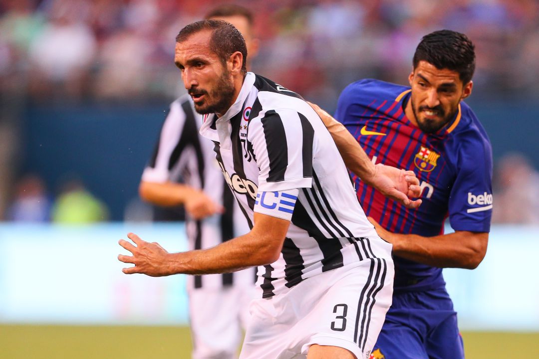 Chiellini y Luis Suárez Chiellini y Luis Suárez