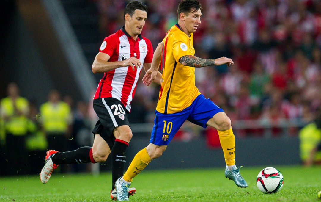 Aduriz y Messi, en un partido entre el Athletic y el FC Barcelona. Aduriz y Messi, en un partido entre el Athletic y el FC Barcelona.