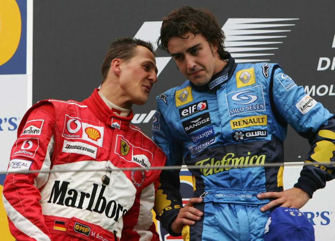 Michael Schumacher junto a Fernando Alonso, en el podio Michael Schumacher junto a Fernando Alonso, en el podio