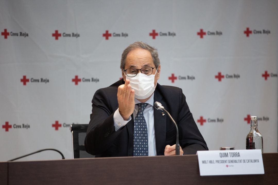 El presidente de la Generalitat, Quim Torra, durante el acto de balance de la campaña del Gobierno de Cataluña con la Cruz Roja para sensibilizar sobre el Covid-19 y disminuir el riesgo de contagios. El presidente de la Generalitat, Quim Torra, durante el acto de balance de la campaña del Gobierno de Cataluña con la Cruz Roja para sensibilizar sobre el Covid-19 y disminuir el riesgo de contagios.
