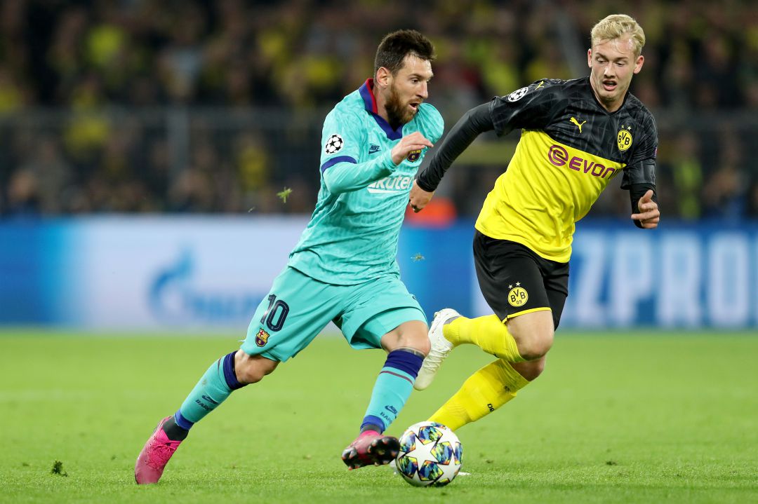 Leo Messi y Julian Brandt en un partido del Barça-Dortmund Leo Messi y Julian Brandt en un partido del Barça-Dortmund