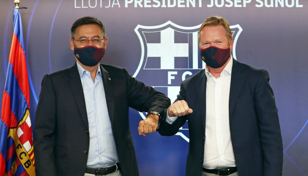 Josep María Bartomeu y Ronald Koeman, durante la presentación del entrenador. Josep María Bartomeu y Ronald Koeman, durante la presentación del entrenador.