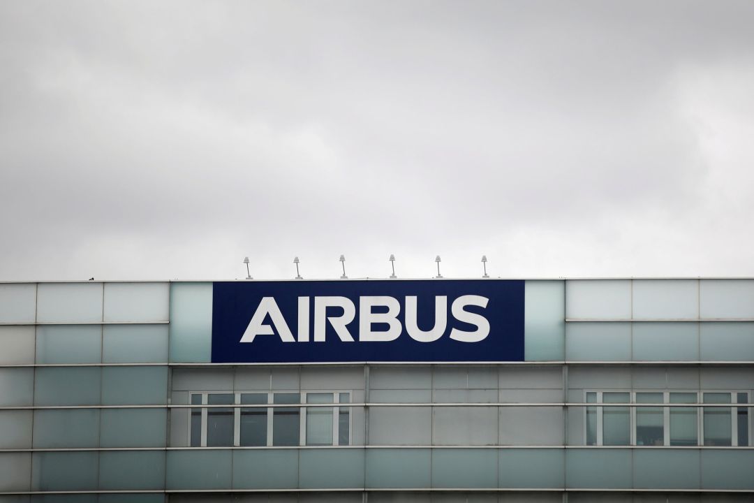 A logo of Airbus is seen at the entrance of its factory A logo of Airbus is seen at the entrance of its factory