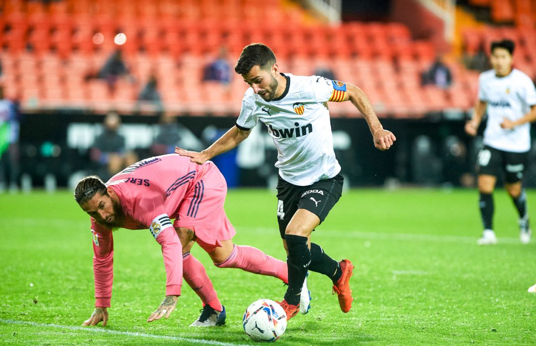 Jose Luis Gaya of Valencia CF and Sergio Ramos of Real Madrid during the La Liga Santander mach between Valencia and Real Madrid at Estadio de Mestalla on November 8, 2020 in Valencia, Spain
AFP7
ONLY FOR USE IN SPAIN Jose Luis Gaya of Valencia CF and Sergio Ramos of Real Madrid during the La Liga Santander mach between Valencia and Real Madrid at Estadio de Mestalla on November 8, 2020 in Valencia, Spain
AFP7
ONLY FOR USE IN SPAIN